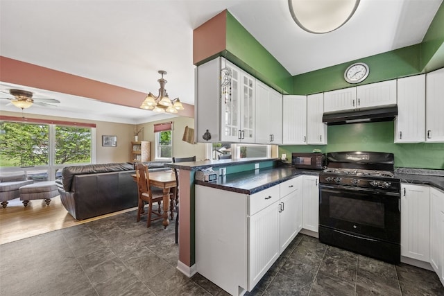 kitchen with black appliances, under cabinet range hood, open floor plan, dark countertops, and a peninsula