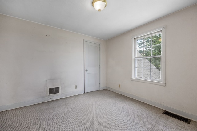 4378 480th St SE, Iowa City, IA 52240 - empty room featuring carpet floors and baseboards