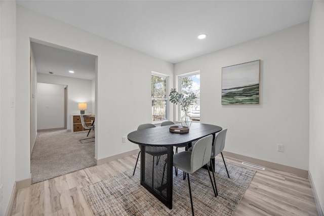 841 S 7th St, Iowa City, IA 52240 - dining room with light wood-style floors, recessed lighting, and baseboards
