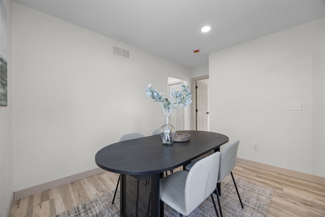 841 S 7th St, Iowa City, IA 52240 - dining area with light wood-style flooring, baseboards, and recessed lighting