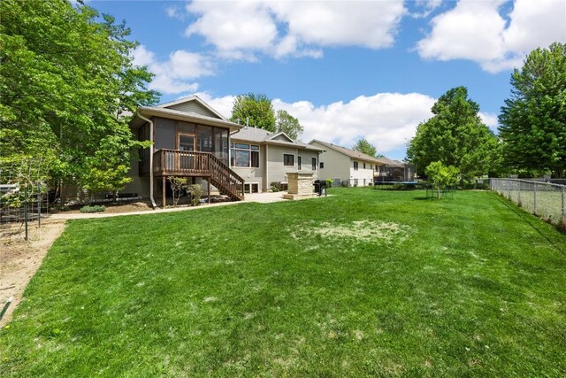 302 6th St NE, Mount Vernon, IA 52314 - back of property with a sunroom and stairs