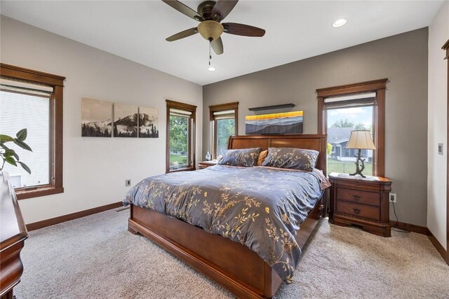 302 6th St NE, Mount Vernon, IA 52314 - carpeted bedroom with baseboards, multiple windows, ceiling fan, and recessed lighting