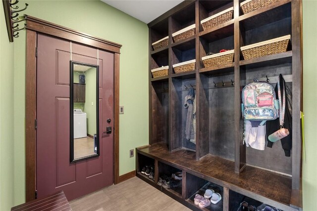 302 6th St NE, Mount Vernon, IA 52314 - mudroom with washer / dryer and wood finished floors