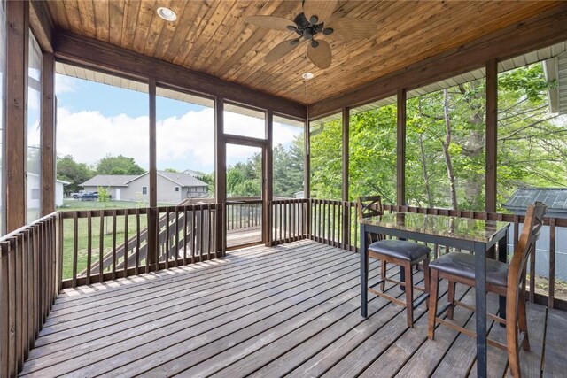 302 6th St NE, Mount Vernon, IA 52314 - sunroom / solarium with ceiling fan and a residential view