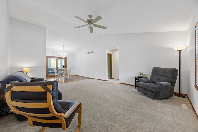 1451 Chamberlain Dr, Iowa City, IA 52240 - living area with lofted ceiling, a chandelier, ceiling fan, carpet flooring, and baseboards