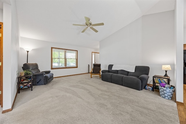 1451 Chamberlain Dr, Iowa City, IA 52240 - living room featuring ceiling fan, baseboards, carpet, and high vaulted ceiling