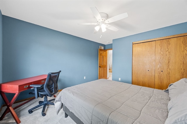 1451 Chamberlain Dr, Iowa City, IA 52240 - carpeted bedroom featuring a ceiling fan and a closet