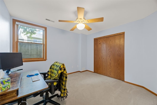 1451 Chamberlain Dr, Iowa City, IA 52240 - office with carpet floors, baseboards, and a ceiling fan