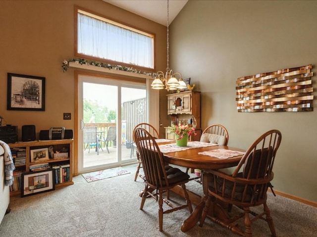3626 Stoneview Cir SW, Cedar Rapids, IA 52404 - dining area with carpet floors, high vaulted ceiling, and a chandelier