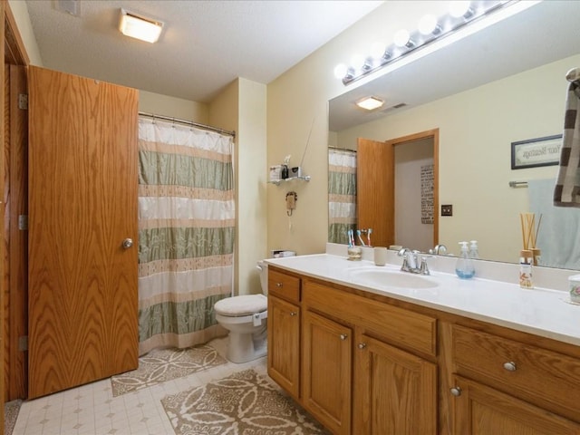 3626 Stoneview Cir SW, Cedar Rapids, IA 52404 - full bathroom with toilet, vanity, and tile patterned floors