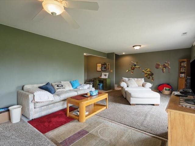 3626 Stoneview Cir SW, Cedar Rapids, IA 52404 - carpeted living room with a ceiling fan