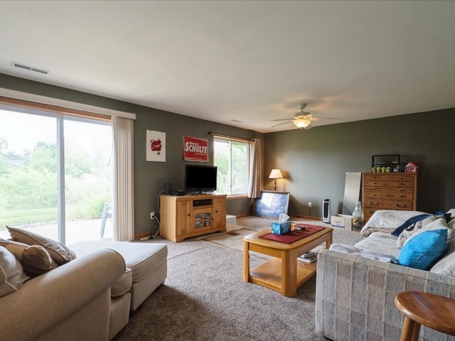3626 Stoneview Cir SW, Cedar Rapids, IA 52404 - living area with carpet and ceiling fan