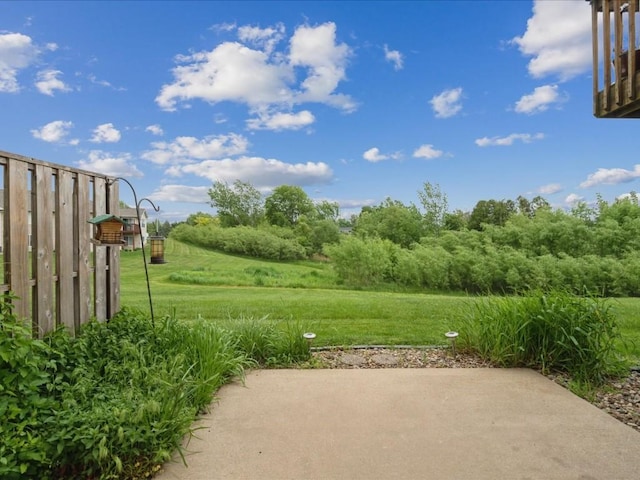 3626 Stoneview Cir SW, Cedar Rapids, IA 52404 - view of grassy yard featuring a patio