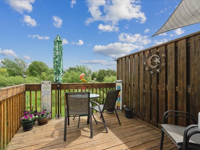 3626 Stoneview Cir SW, Cedar Rapids, IA 52404 - wooden terrace with outdoor dining area