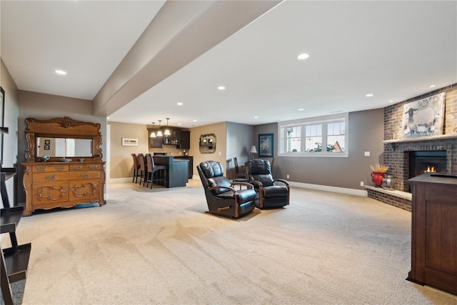 1443 69th St, Keystone, IA 52249 - living room with light colored carpet, baseboards, recessed lighting, a fireplace, and bar