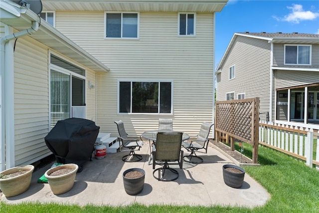 3205 Lennon Ln, Marion, IA 52302 - view of patio with area for grilling, fence, and outdoor dining space