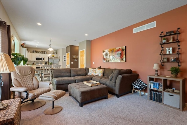 3205 Lennon Ln, Marion, IA 52302 - living room featuring light colored carpet and recessed lighting
