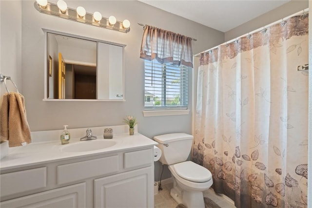 3205 Lennon Ln, Marion, IA 52302 - bathroom featuring vanity, toilet, and baseboards