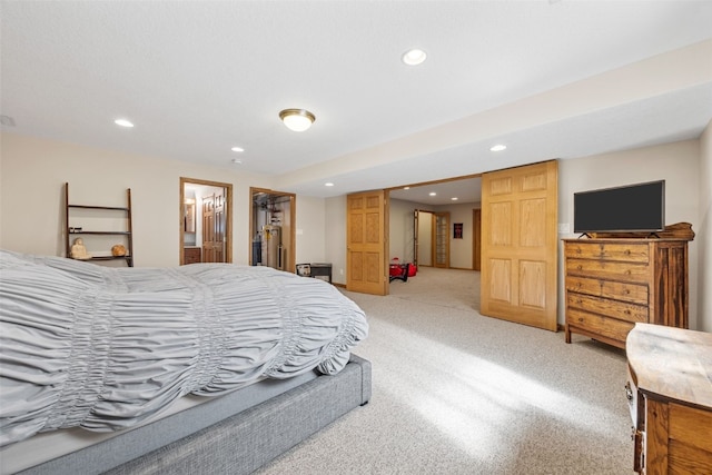bedroom with recessed lighting and light colored carpet