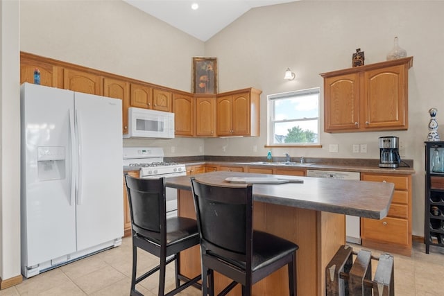 kitchen featuring white appliances, high vaulted ceiling, a sink, dark countertops, and light tile patterned floors