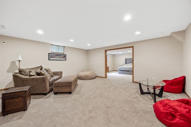 living area with recessed lighting, carpet, and baseboards