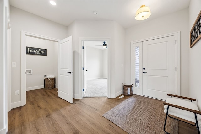 424 15th Ave SW, Mount Vernon, IA 52314 - entryway with light wood-style flooring, baseboards, and recessed lighting