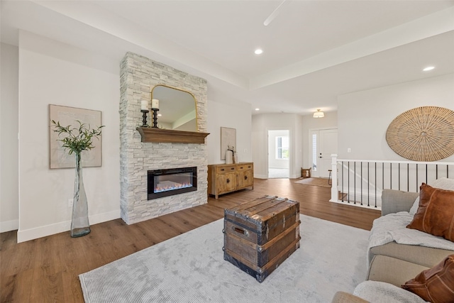 424 15th Ave SW, Mount Vernon, IA 52314 - living room with wood finished floors, baseboards, recessed lighting, and a fireplace