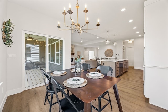 424 15th Ave SW, Mount Vernon, IA 52314 - dining area with light wood-style flooring, baseboards, a ceiling fan, recessed lighting, and a chandelier