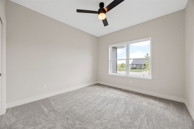 424 15th Ave SW, Mount Vernon, IA 52314 - carpeted spare room featuring baseboards and a ceiling fan