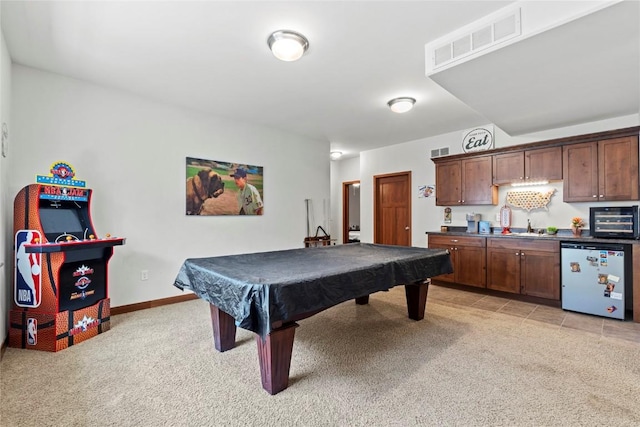 395 Carlyle Dr, North Liberty, IA 52317 - recreation room with light carpet, pool table, a sink, and baseboards