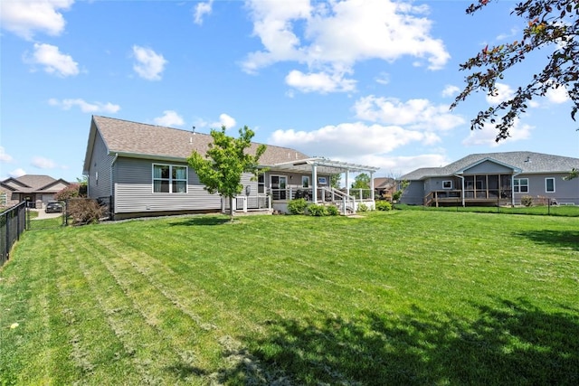 395 Carlyle Dr, North Liberty, IA 52317 - back of property with a pergola and a sunroom