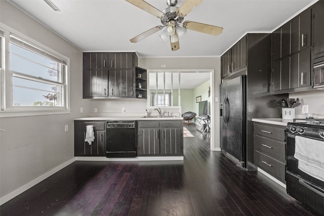 3353 Midway Rd, Marion, IA 52302 - kitchen with black appliances, a sink, open shelves, baseboards, and light countertops