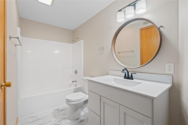 942 Evergreen Ct, Iowa City, IA 52245 - bathroom featuring marble look tile flooring, toilet, vanity, and tub / shower combination