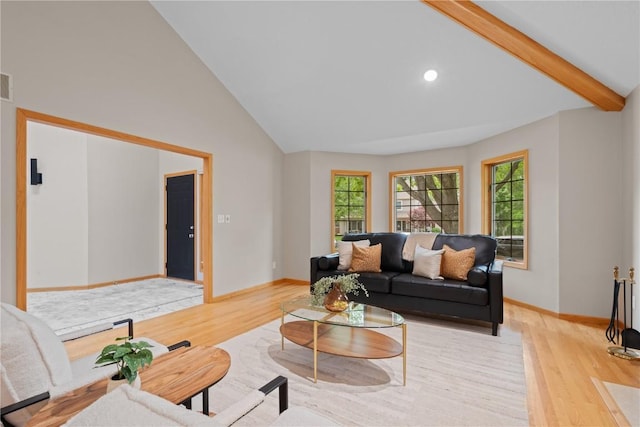 942 Evergreen Ct, Iowa City, IA 52245 - living room with light wood-style floors, vaulted ceiling, baseboards, and recessed lighting