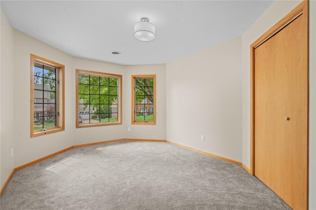 942 Evergreen Ct, Iowa City, IA 52245 - unfurnished room featuring carpet and baseboards