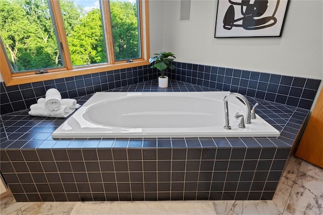 942 Evergreen Ct, Iowa City, IA 52245 - full bath with healthy amount of natural light and a garden tub