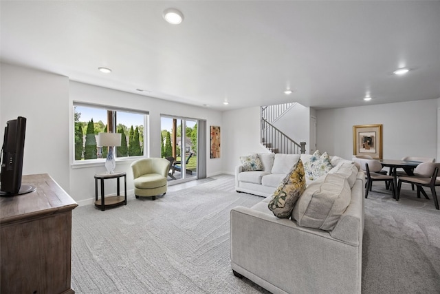 8 Pinnacle Ln, Tiffin, IA 52340 - carpeted living room featuring stairway, recessed lighting, and baseboards