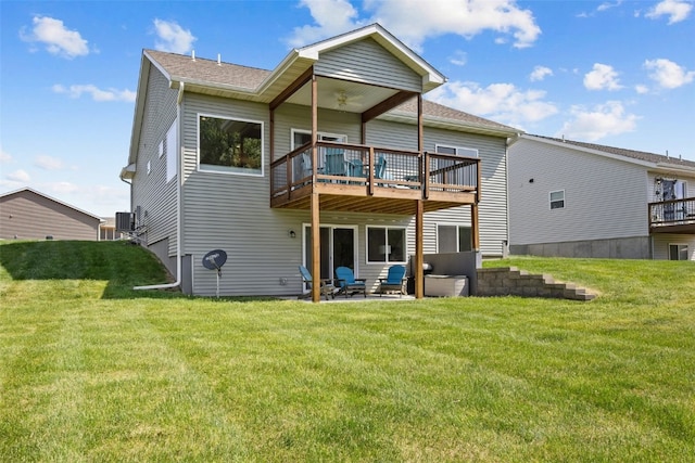 8 Pinnacle Ln, Tiffin, IA 52340 - rear view of house featuring a deck, a yard, and a patio area