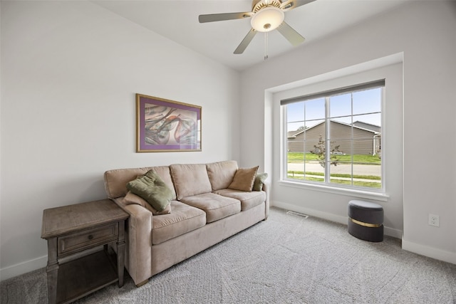 8 Pinnacle Ln, Tiffin, IA 52340 - living area featuring carpet flooring, baseboards, and ceiling fan