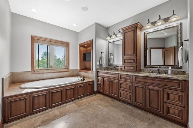 4355 Par Cir, Marion, IA 52302 - bathroom featuring a garden tub and double vanity