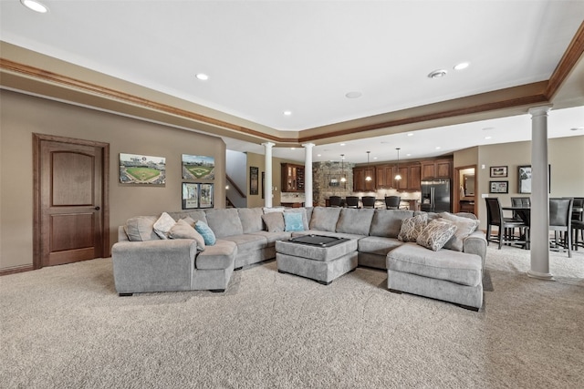 4355 Par Cir, Marion, IA 52302 - living area featuring decorative columns, recessed lighting, light colored carpet, and a raised ceiling