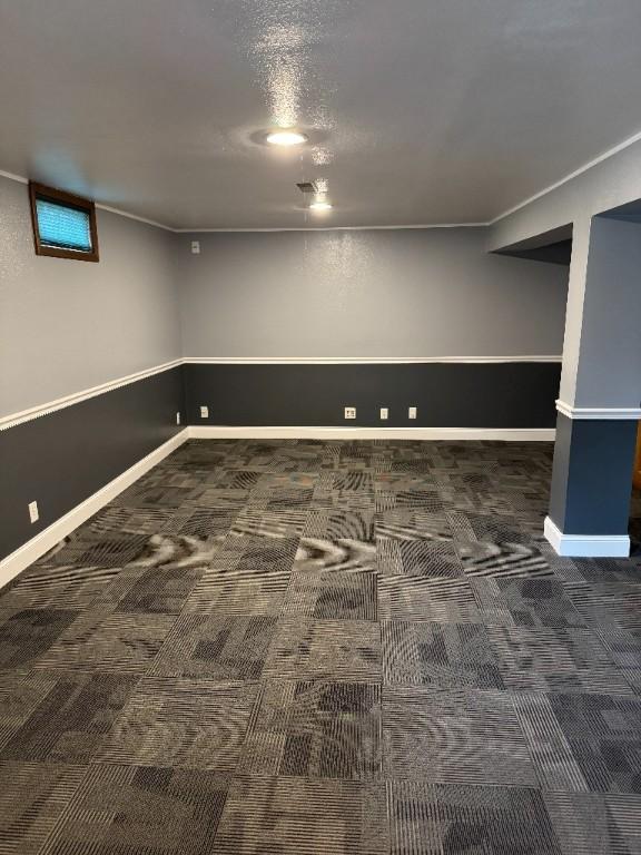 3105 Wilson Ave SW, Cedar Rapids, IA 52404 - finished basement featuring carpet floors and baseboards