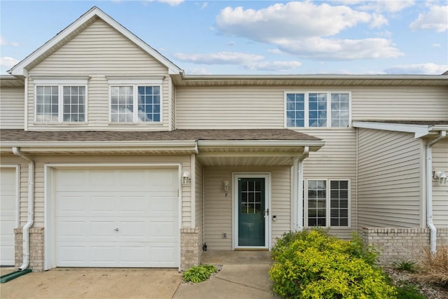 3035 English Glen Ct Unit D7, Marion, IA 52302 - view of property with a garage and concrete driveway