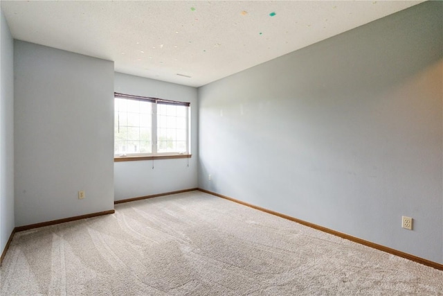 3035 English Glen Ct Unit D7, Marion, IA 52302 - carpeted spare room featuring baseboards