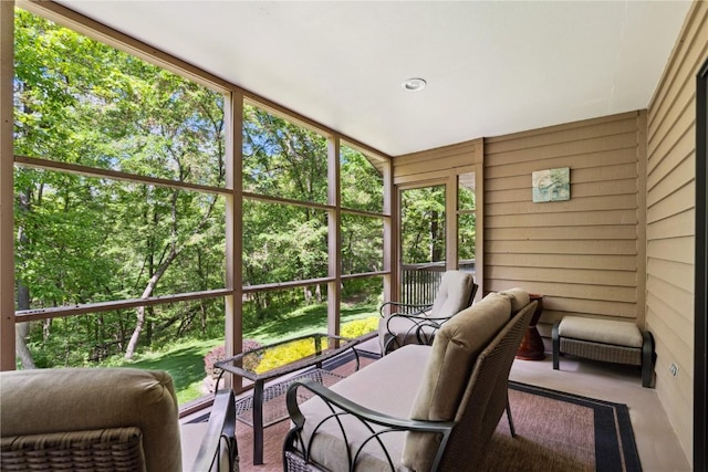 1445 NE Butternut Ln, Swisher, IA 52338 - sunroom / solarium with an outdoor hangout area