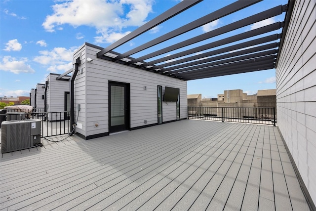 830 Newton Rd Unit 4, Iowa City, IA 52246 - wooden terrace with central AC and a pergola