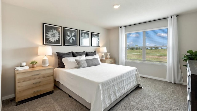 626 Maddie Ln, Tiffin, IA 52340 - carpeted bedroom featuring baseboards