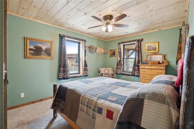 2527 61st St Ln Lot 1, Vinton, IA 52349 - carpeted bedroom featuring wooden ceiling, baseboards, a ceiling fan, and crown molding