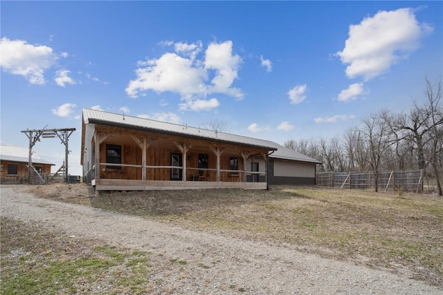 2527 61st St Ln Lot 1, Vinton, IA 52349 - view of front of house with metal roof and an exterior structure