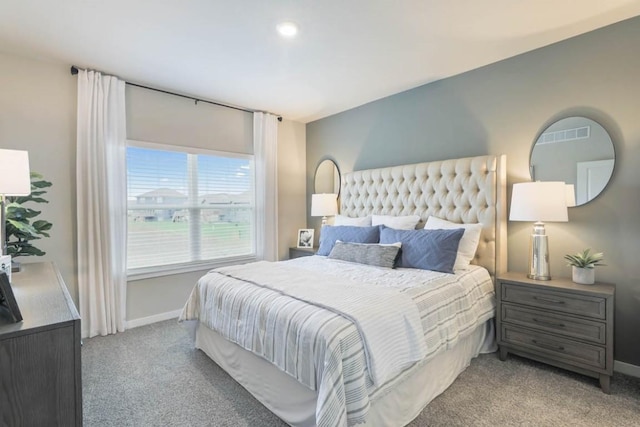 704 Magnolia Way, Tiffin, IA 52340 - bedroom featuring carpet floors and baseboards